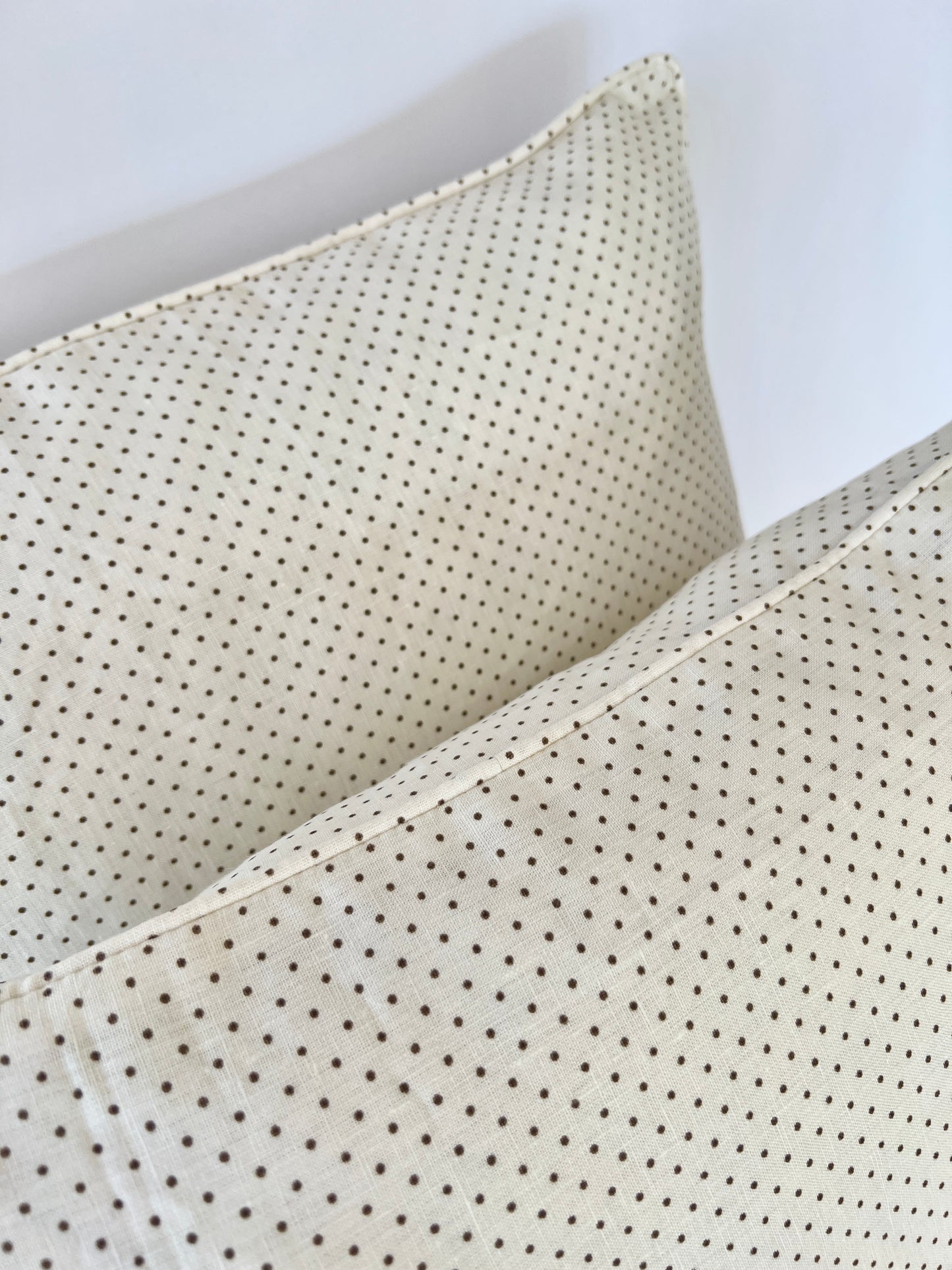 Flint dots on Ivory pillow