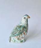 Ceramic bird sculpture