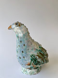 Ceramic bird sculpture